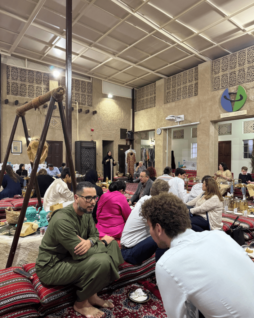 Delegates seated in a traditional majlis session